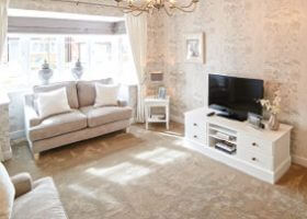 A Jones Homes lounge, showcasing how a tidy living room can help to sell a house quickly