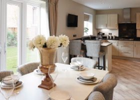 A vase of flowers on a table is a great tip when you're selling a house