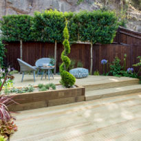 An image of a landscaped and manicured rear garden