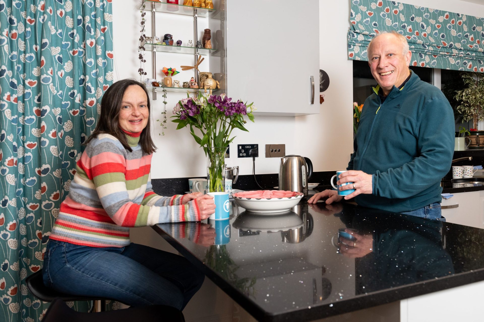 A couple inside their new home at Stonecross Meadows